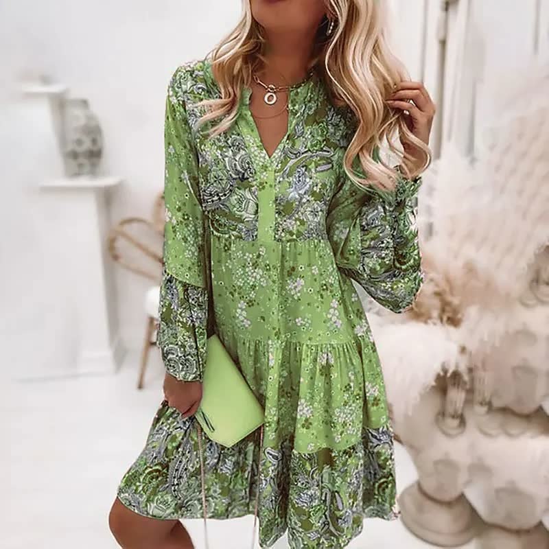 Boho zomerjurk dames met kleurrijke print, V-hals, flairmouwen en midi lengte, ideaal voor zomerse gelegenheden.