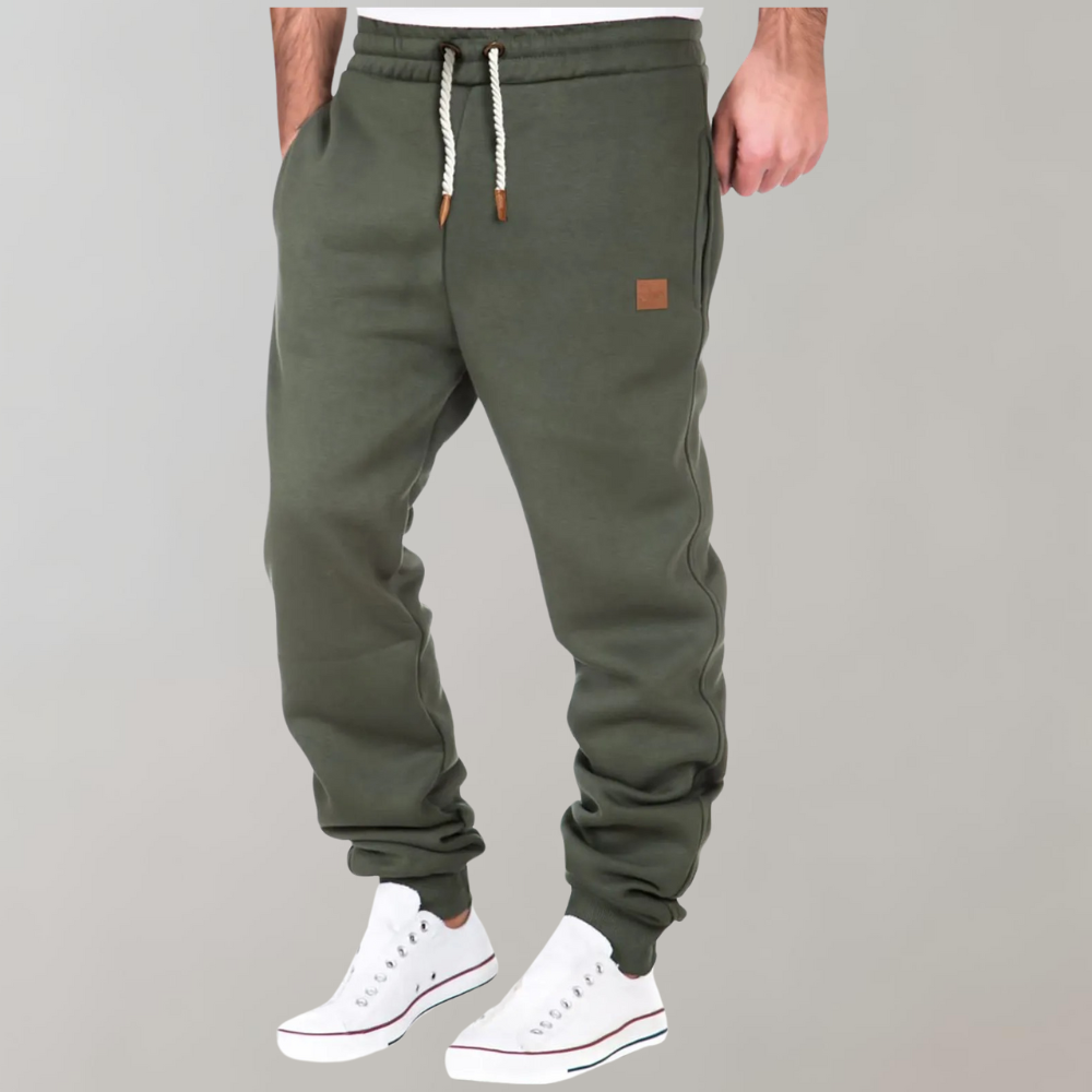 "Comfortabele heren joggingbroek, zacht materiaal, elastische tailleband, casual stijl, perfect voor thuis en uitjes."