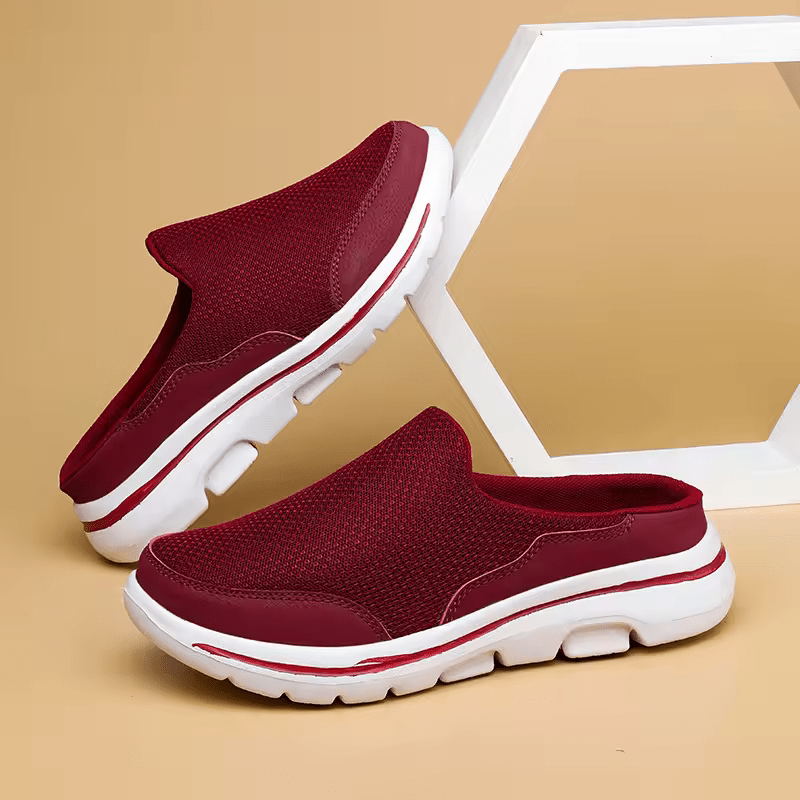 "Comfortabele herenpantoffels met zachte demping, ademend textiel en tijdloze stijl voor ultiem draagcomfort binnenshuis."