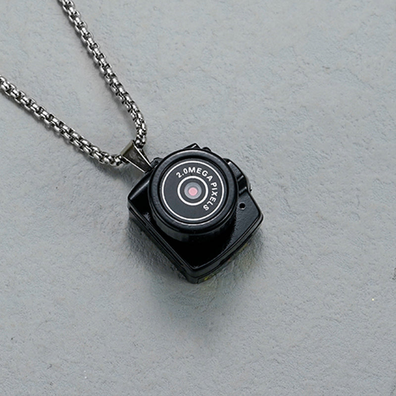 "Compacte HD mini videocamera, draagbaar ontwerp met schokbestendige behuizing, ideaal voor scherpe 1080HD opnamen."