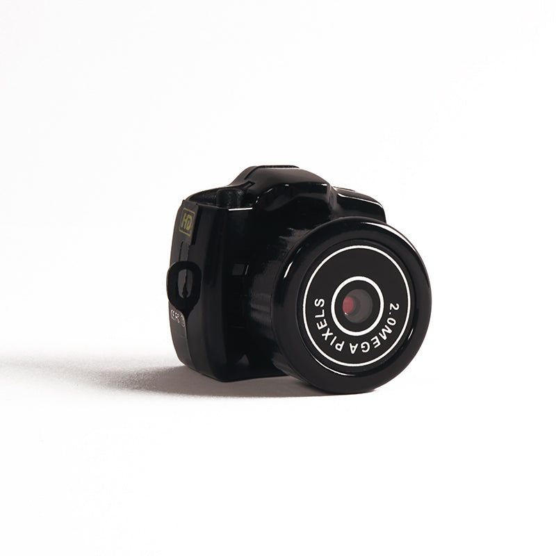 "Compacte HD mini videocamera, draagbaar ontwerp met schokbestendige behuizing, ideaal voor scherpe 1080HD opnamen."