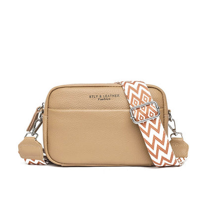 "Compacte leren handtas, elegant design, beige schoudertas voor dames met royale binnenruimte en duurzame PU-materialen."