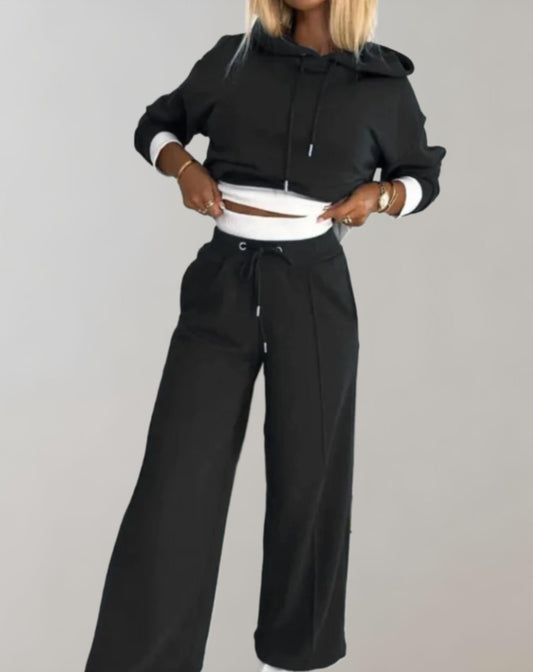 "Dames jogger set, zachte hoodie met joggingbroek in lichtgrijs, comfortabele pasvorm, ideaal voor casual en thuisgebruik."
