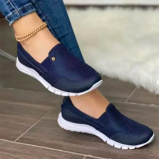 "Dames slip-on orthopedische diabetesschoenen in elegant roze, met ademend textiel en antislip zool voor optimaal comfort."