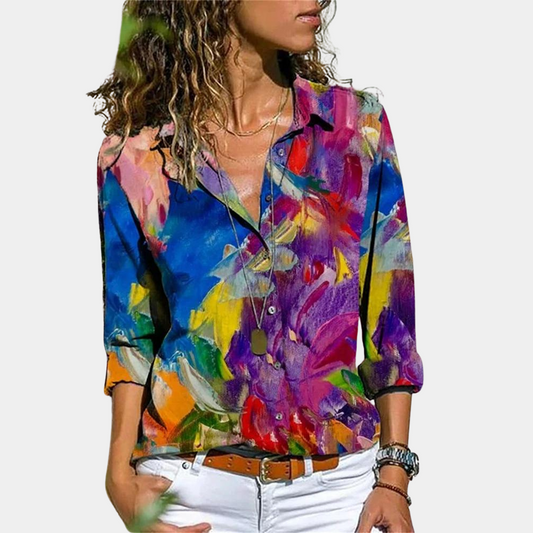 Damesblouse met kleurrijke zomerse print, comfortabele pasvorm, levendige kleuren, flatterend ontwerp, zachte stof.