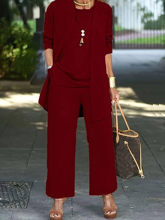 "Driedelige dames broekpak set in blauw, met elegant vest, topje en lange broek, perfect voor stijl en comfort."