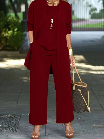 "Driedelige dames broekpak set in blauw, met elegant vest, topje en lange broek, perfect voor stijl en comfort."