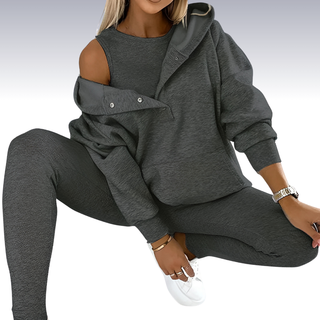 "Driedelige sportset dames met elegante top, sportbeha en legging; ademende en elastische stoffen voor comfort en stijl."