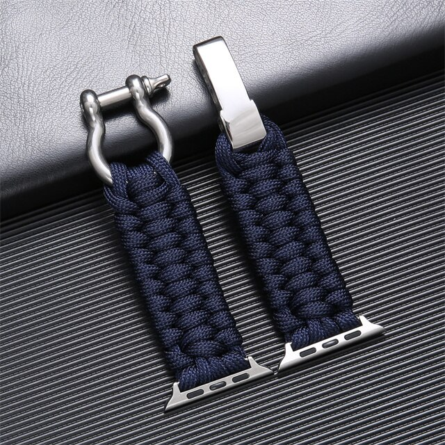 "Duurzaam nylon Okimo bandje voor Apple Watch met robuust paracord design en zware roestvrijstalen sluiting."