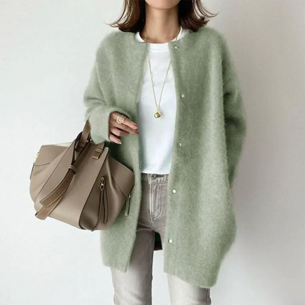 "Elegant damesvest, fijn gebreid in beige voor stijlvolle en comfortabele looks, ideaal voor elk seizoen."