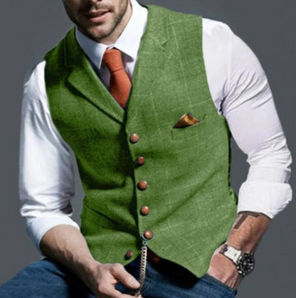 "Elegant donkergrijs herengilet van tweedstof, klassiek en veelzijdig, ideaal voor zowel formele als casual gelegenheden."