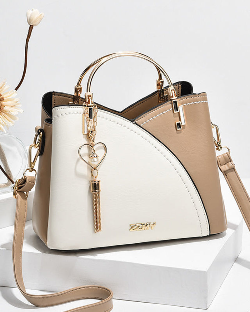 Elegante 2-weg handtas, gemaakt van PU-leer, met glanzende metalen en strass accenten, veelzijdig voor elke gelegenheid.