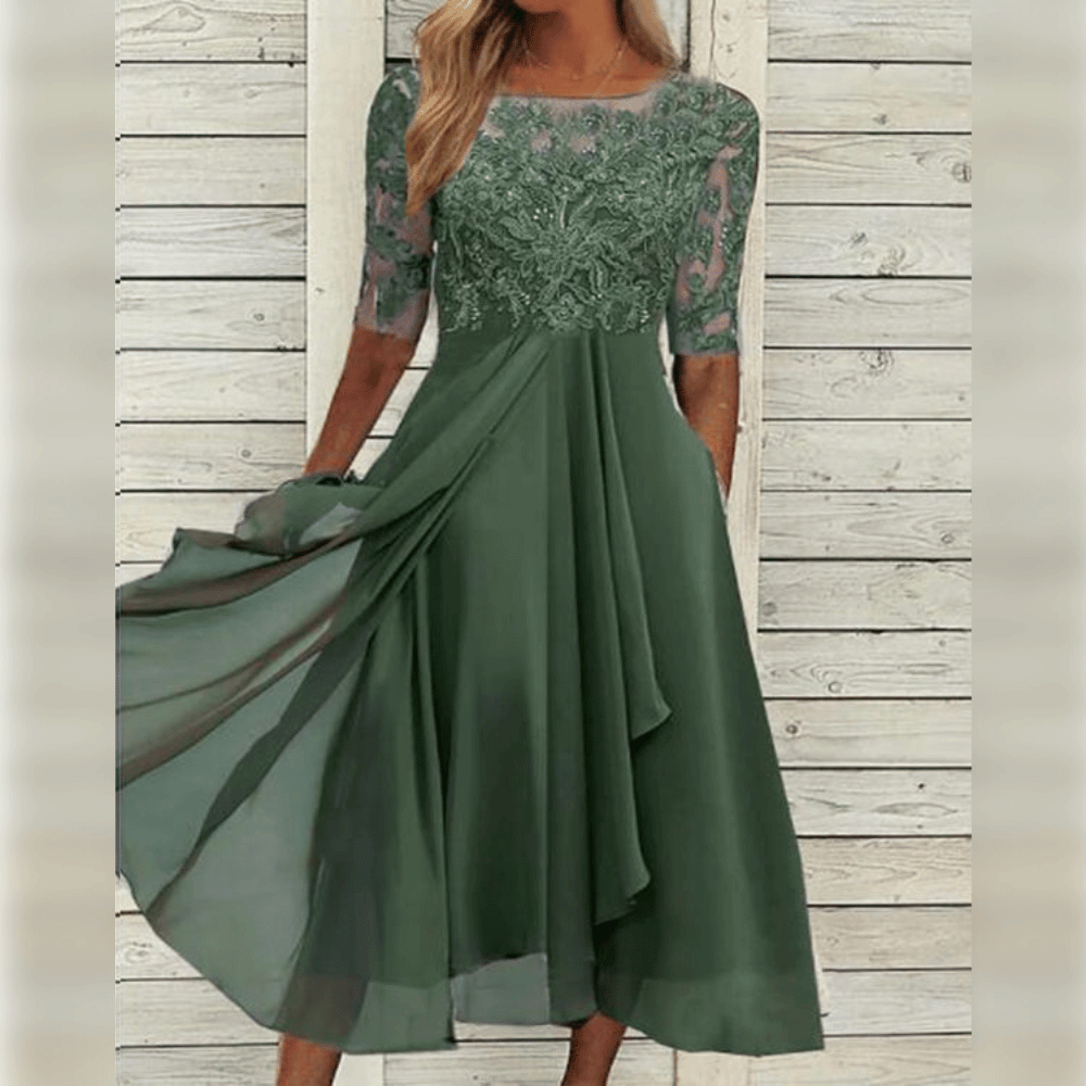 Elegante chiffon jurk met kant, halflange mouwen en flatterende pasvorm, perfect voor feestelijke gelegenheden.