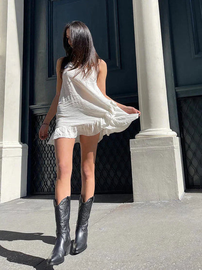 "Elegante dames cowboylaarzen met sprankelende metallic afwerking, hoge hak en moderne uitstraling voor een glamoureuze look.