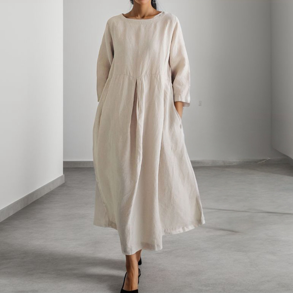 Elegante dames midi jurk in geelbruin, losvallend met ademende stof, perfect voor zomer; veelzijdig en comfortabel.