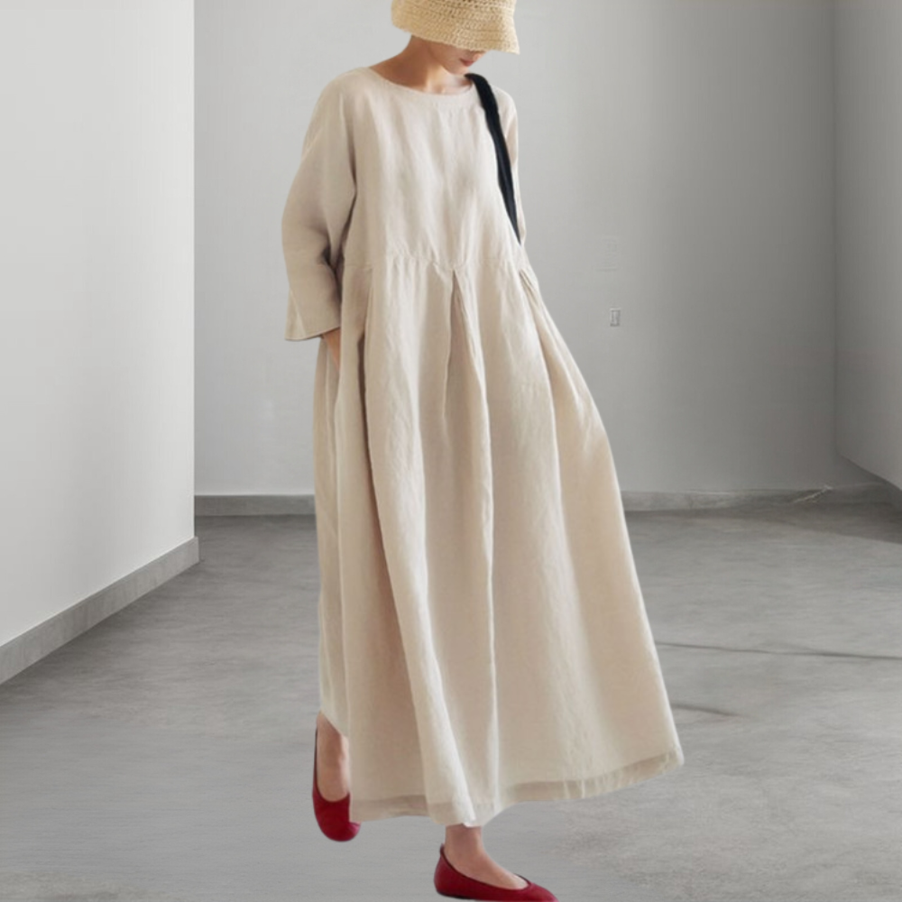Elegante dames midi jurk in geelbruin, losvallend met ademende stof, perfect voor zomer; veelzijdig en comfortabel.