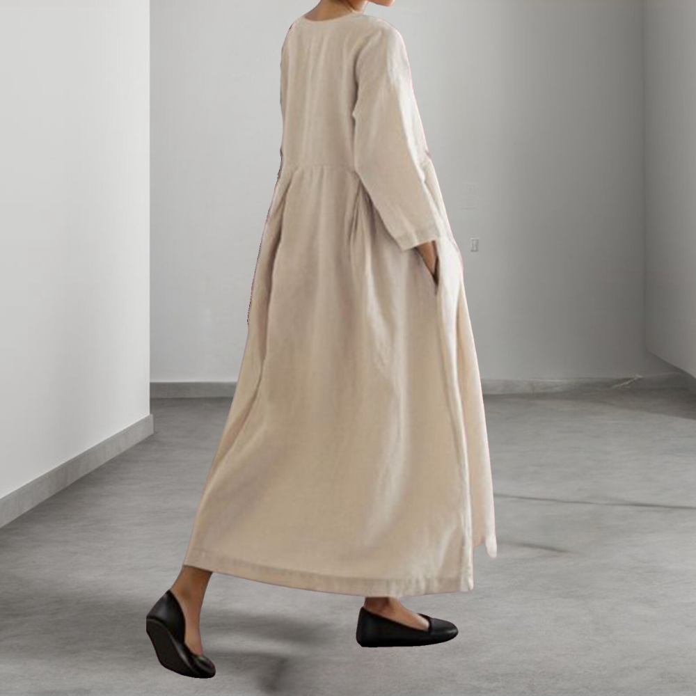 Elegante dames midi jurk in geelbruin, losvallend met ademende stof, perfect voor zomer; veelzijdig en comfortabel.