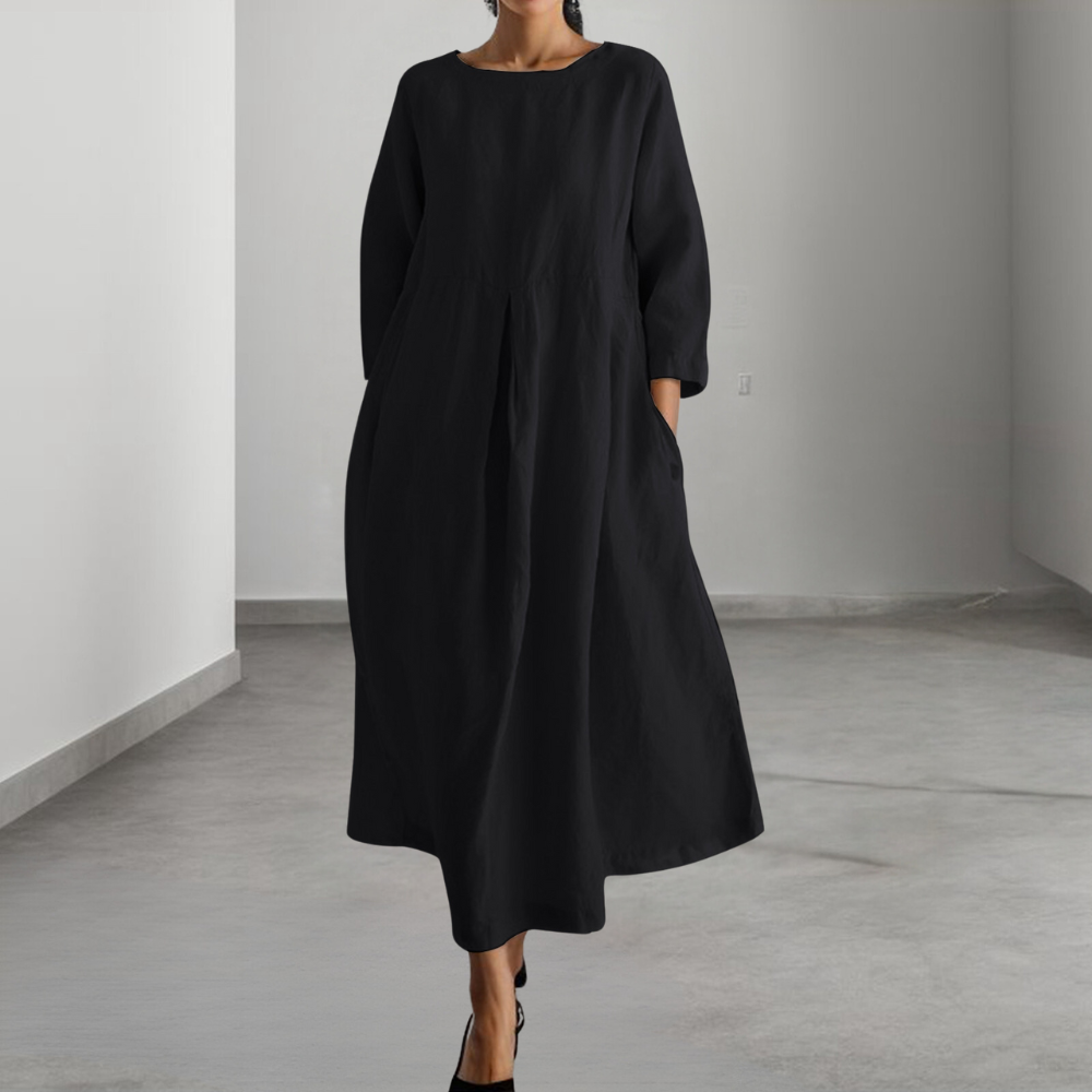 Elegante dames midi jurk in geelbruin, losvallend met ademende stof, perfect voor zomer; veelzijdig en comfortabel.