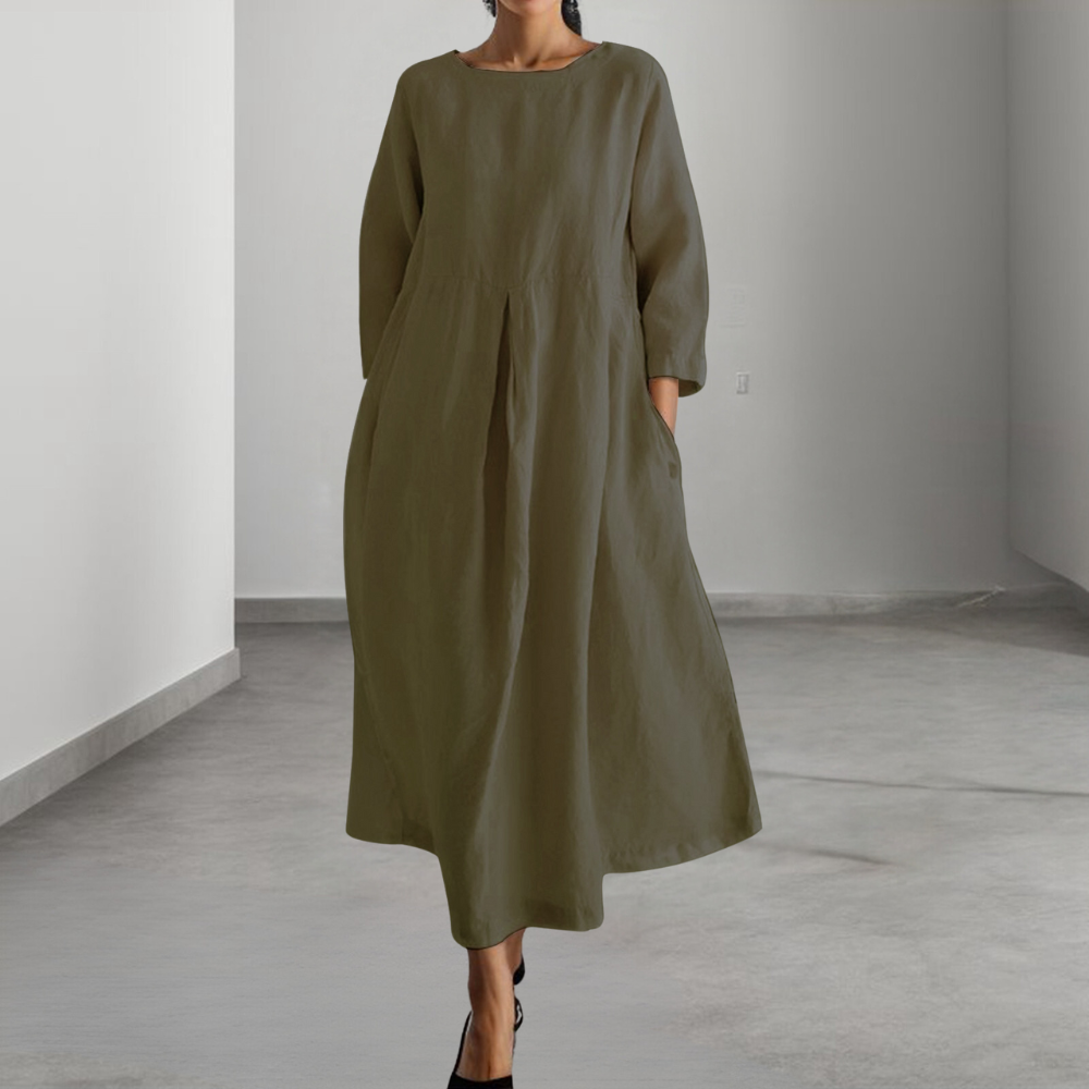 Elegante dames midi jurk in geelbruin, losvallend met ademende stof, perfect voor zomer; veelzijdig en comfortabel.