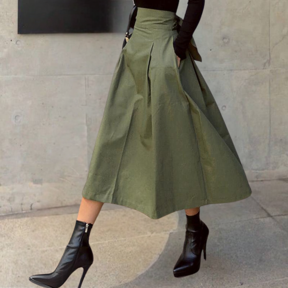 "Elegante damesrok met hoge taille in groen, licht uitlopend, van zacht katoen voor een modieuze en comfortabele look."