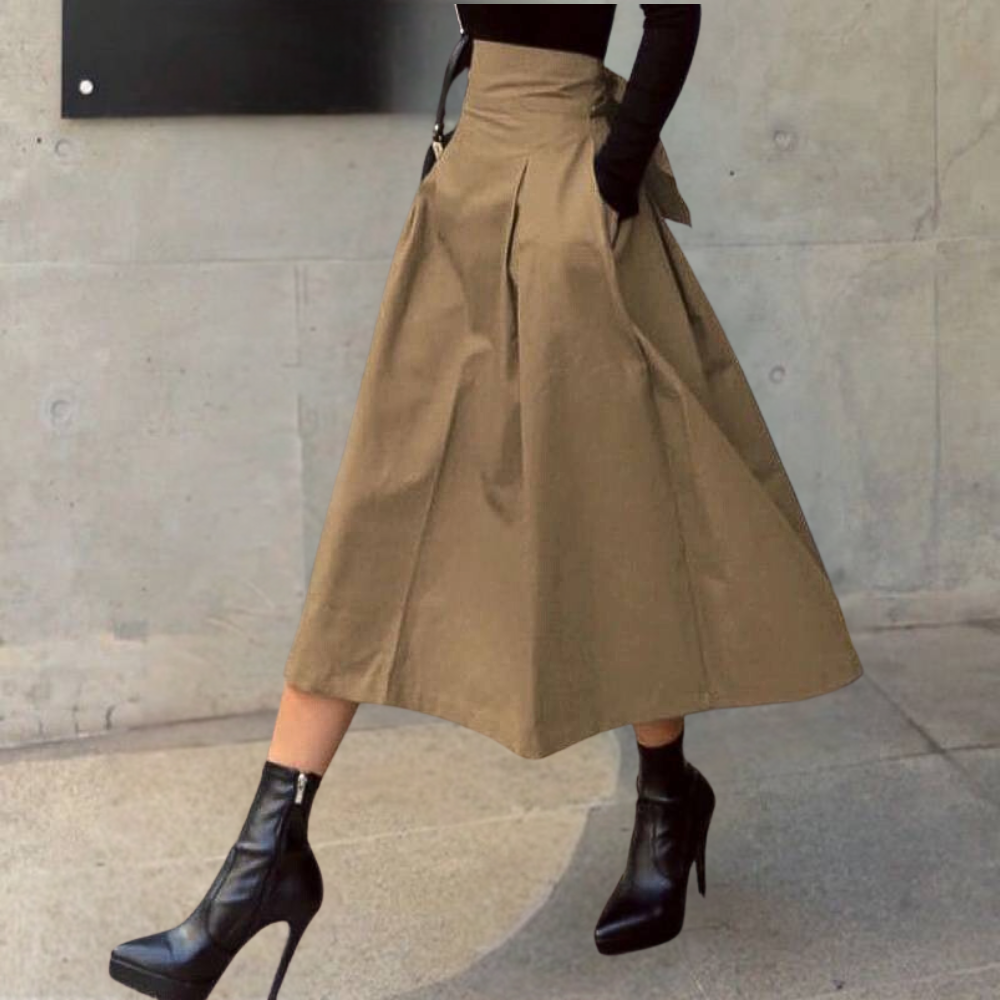 "Elegante damesrok met hoge taille in groen, licht uitlopend, van zacht katoen voor een modieuze en comfortabele look."
