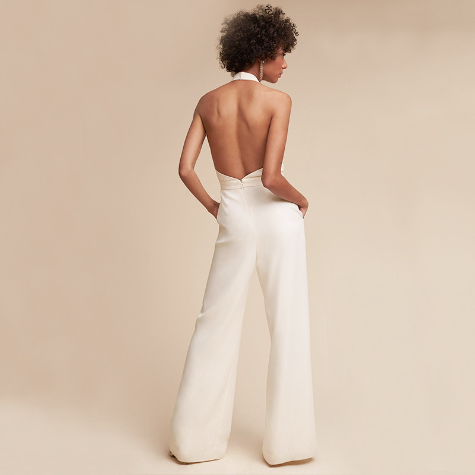 "Elegante Elina jumpsuit voor dames, met wijde broek en korte mouwen, in effen kleur voor veelzijdige stylingsopties."