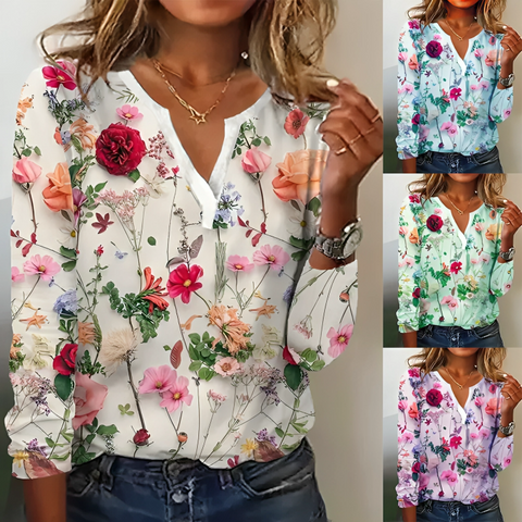 "Elegante Elisa blouse met bloemenpatroon, V-hals en lange mouwen, voor een verfijnde uitstraling in dameskleding."
