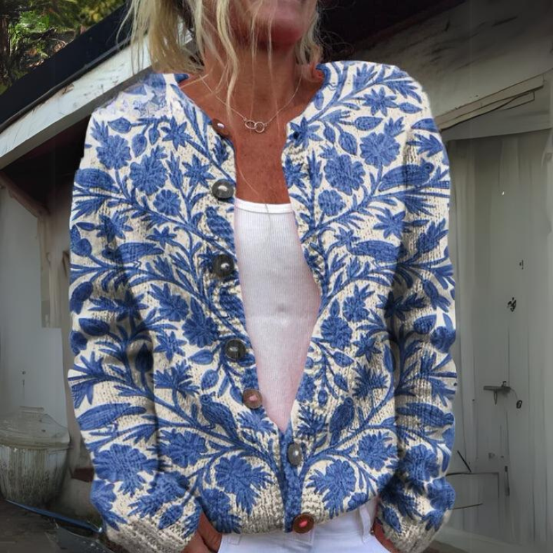 "Elegante gebloemde gebreide cardigan voor dames, met bloemenpatroon en knoopdetails, ideaal voor elke gelegenheid."