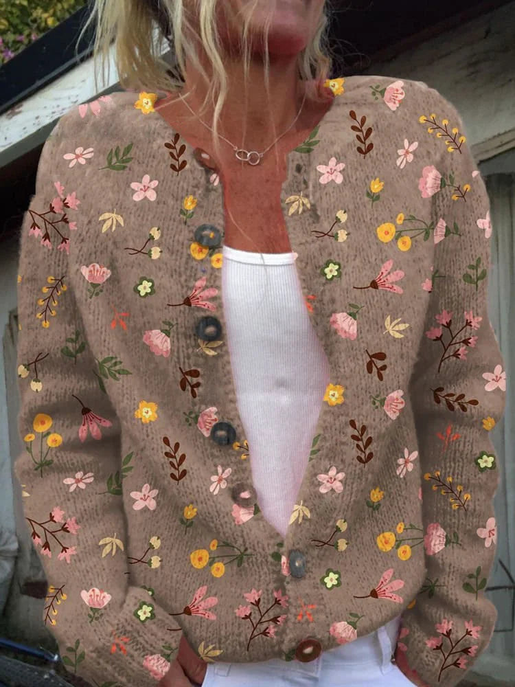 "Elegante gebloemde gebreide cardigan voor dames, met bloemenpatroon en knoopdetails, ideaal voor elke gelegenheid."