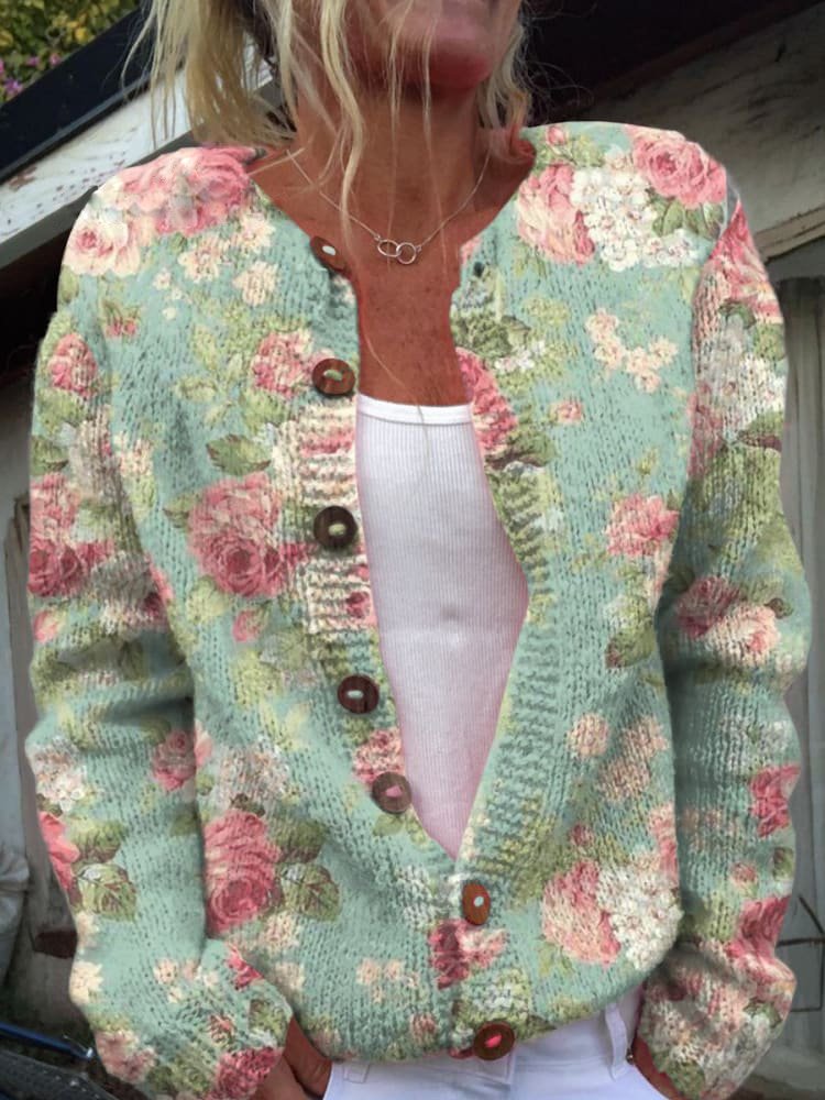 "Elegante gebloemde gebreide cardigan voor dames, met bloemenpatroon en knoopdetails, ideaal voor elke gelegenheid."