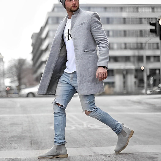 "Elegante herenblazerjas, grijs met een slank design, hoogwaardige stof, ideaal voor zowel casual als formele gelegenheden."