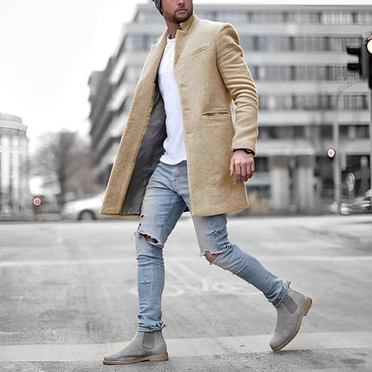 "Elegante herenblazerjas, grijs met een slank design, hoogwaardige stof, ideaal voor zowel casual als formele gelegenheden."