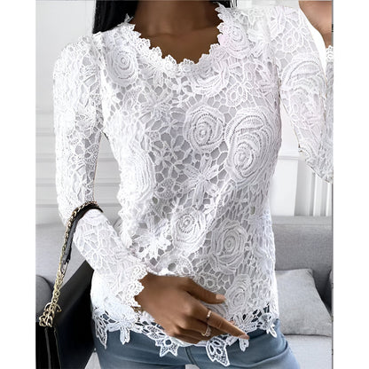 "Elegante kanten blouse met lange mouwen, vrouwelijke uitstraling, klassieke ronde hals, ideaal voor elke gelegenheid."