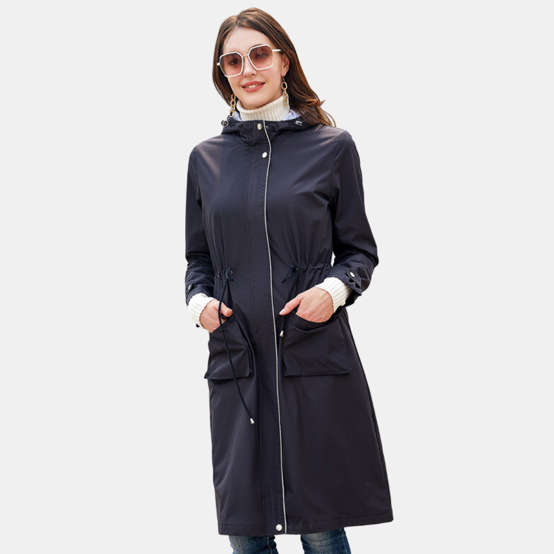 "Elegante lange damesregenjas, waterdicht, stijlvol, perfect voor regenachtige dagen en verschillende gelegenheden."
