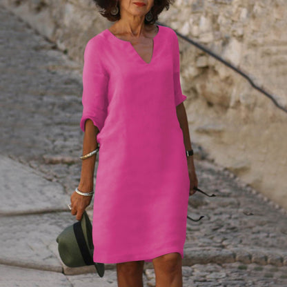 Elegante Marjan zomerjurk met V-hals, 3/4 mouwen, lichtgewicht stof, perfect voor casual en informele gelegenheden.