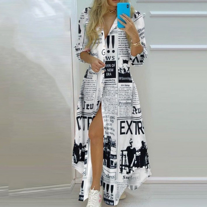"Elegante maxi Antonia zomerjurk met artistieke kranten print, perfecte pasvorm voor trendy zomerse look."