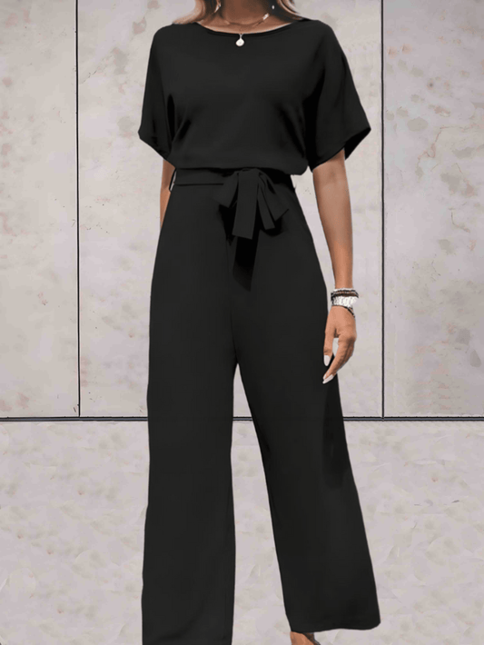 "Elegante Noa jumpsuit voor dames met wijde mouwen en striklinten, comfortabele luchtige stof, ideaal voor elke gelegenheid."