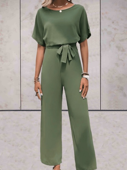"Elegante Noa jumpsuit voor dames met wijde mouwen en striklinten, comfortabele luchtige stof, ideaal voor elke gelegenheid."