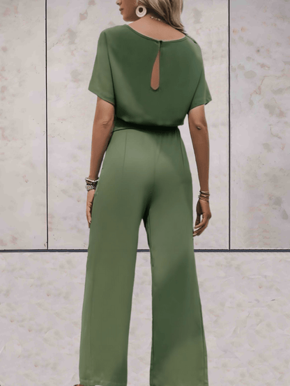 "Elegante Noa jumpsuit voor dames met wijde mouwen en striklinten, comfortabele luchtige stof, ideaal voor elke gelegenheid."