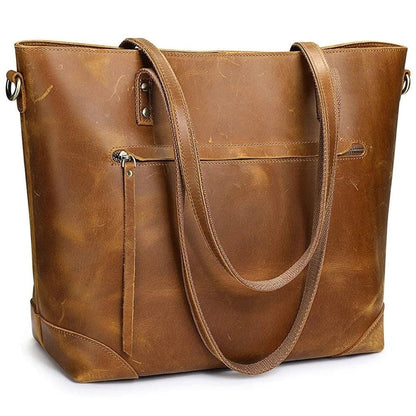 "Elegante vintage leren draagtas van PU-leer met verstelbare schouderriem, ruim interieur en meerdere vakken."