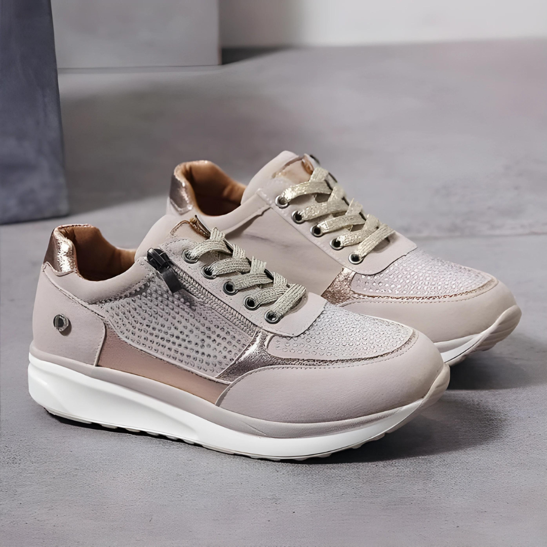 "Elegante vrouwen orthopedische sneakers, grijze tone, perfecte mix van comfort en stijl voor dagelijkse wandelingen."
