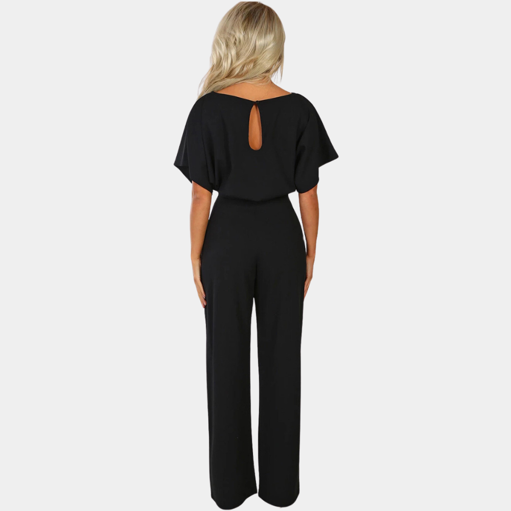 "Elegante zwarte dames jumpsuit met wijde pijpen, perfect voor zomerfeesten; tijdloze stijl en ultiem draagcomfort."