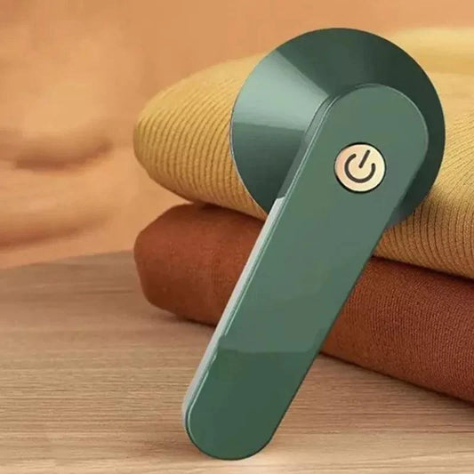 "Elektrische draagbare pluizenverwijderaar, compact design, ideaal voor kleding en meubels, veilig en eenvoudig in gebruik."