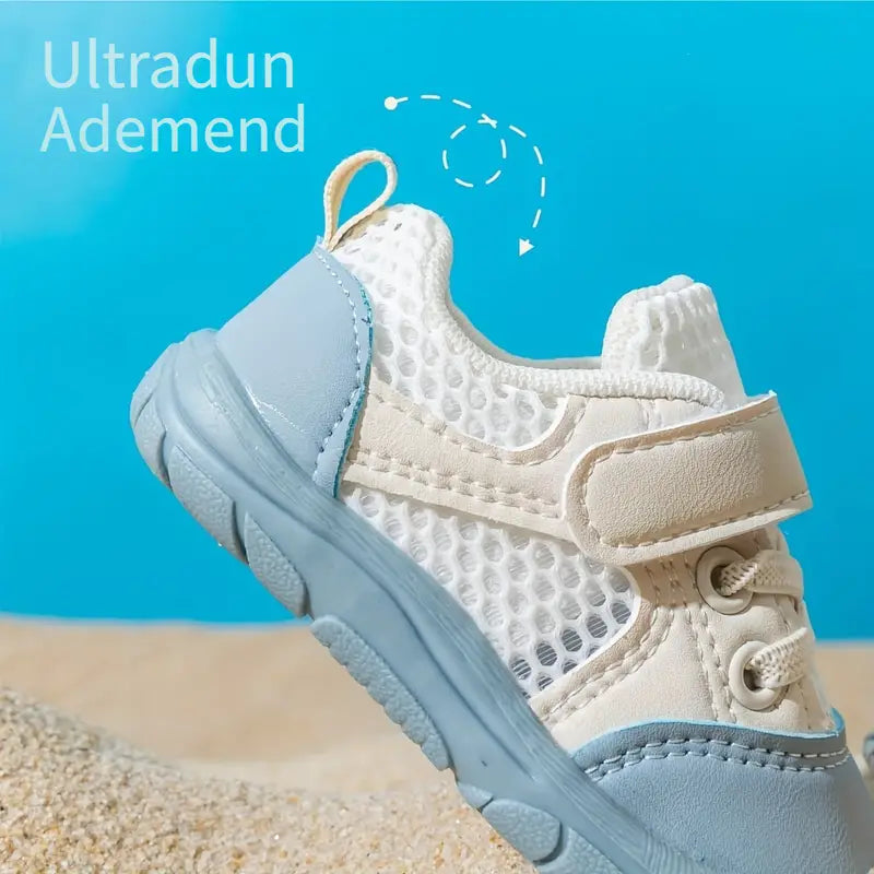Flexibele Ember barefoot babyschoenen, zacht en ademend, met antislip zool. Perfect voor comfort en natuurlijke voetontwikkel