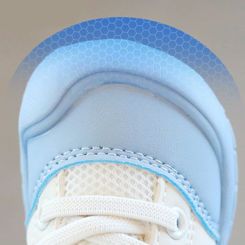 Flexibele Ember barefoot babyschoenen, zacht en ademend, met antislip zool. Perfect voor comfort en natuurlijke voetontwikkel