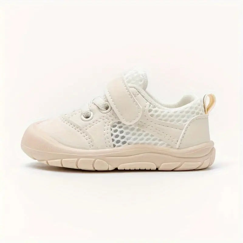 Flexibele Ember barefoot babyschoenen, zacht en ademend, met antislip zool. Perfect voor comfort en natuurlijke voetontwikkel
