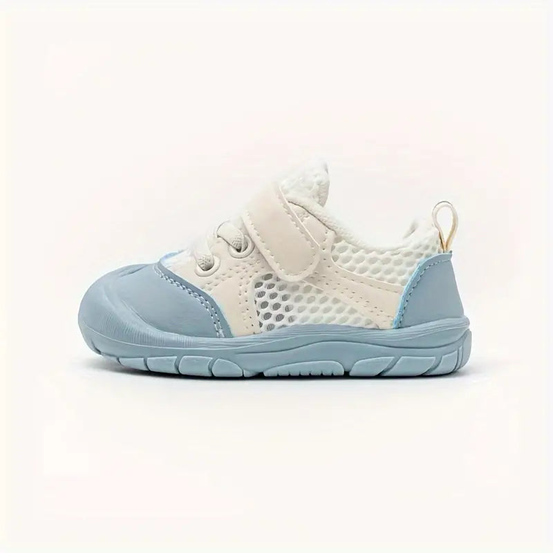 Flexibele Ember barefoot babyschoenen, zacht en ademend, met antislip zool. Perfect voor comfort en natuurlijke voetontwikkel