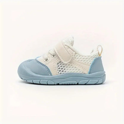 Flexibele Ember barefoot babyschoenen, zacht en ademend, met antislip zool. Perfect voor comfort en natuurlijke voetontwikkel