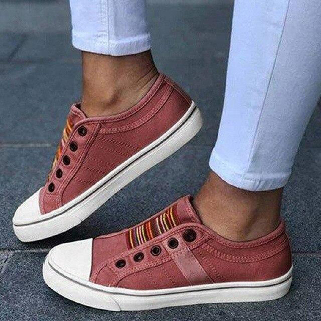 "Grijze slip-on zomersneakers dames, stijlvol en modieus kanvasontwerp zonder veters, voor dagelijks comfort."