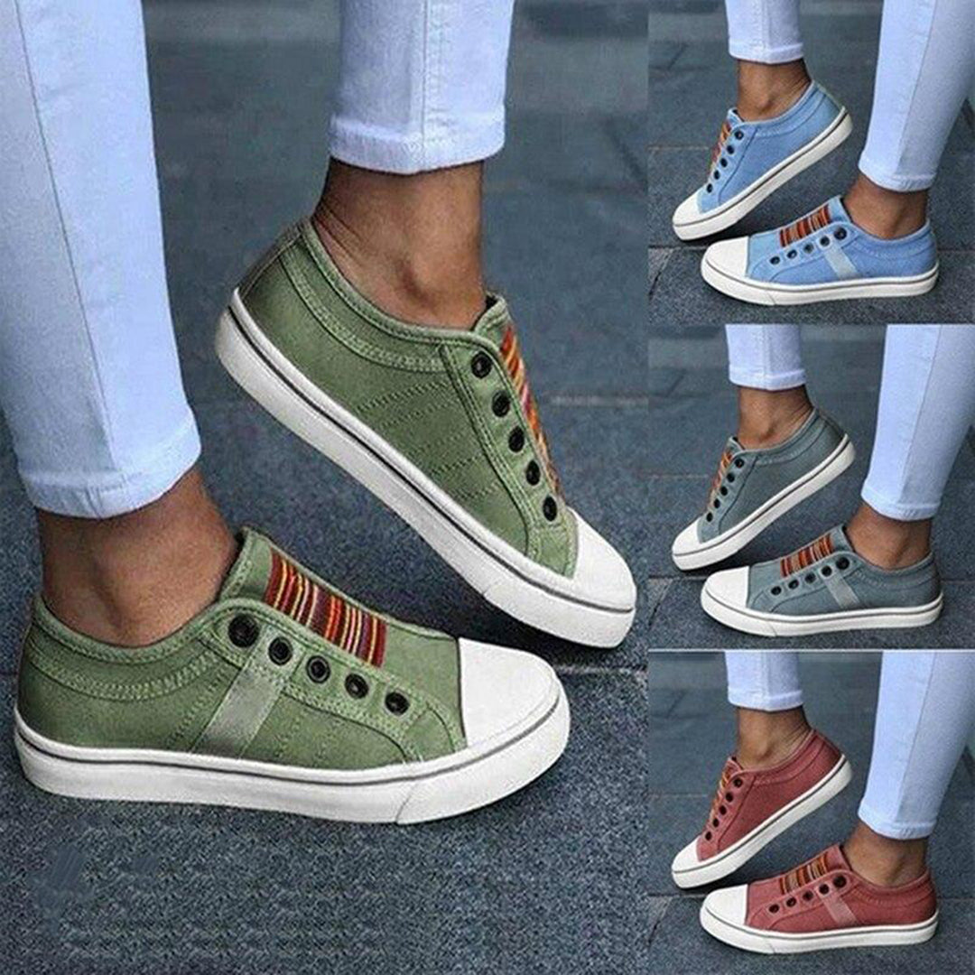 "Grijze slip-on zomersneakers dames, stijlvol en modieus kanvasontwerp zonder veters, voor dagelijks comfort."